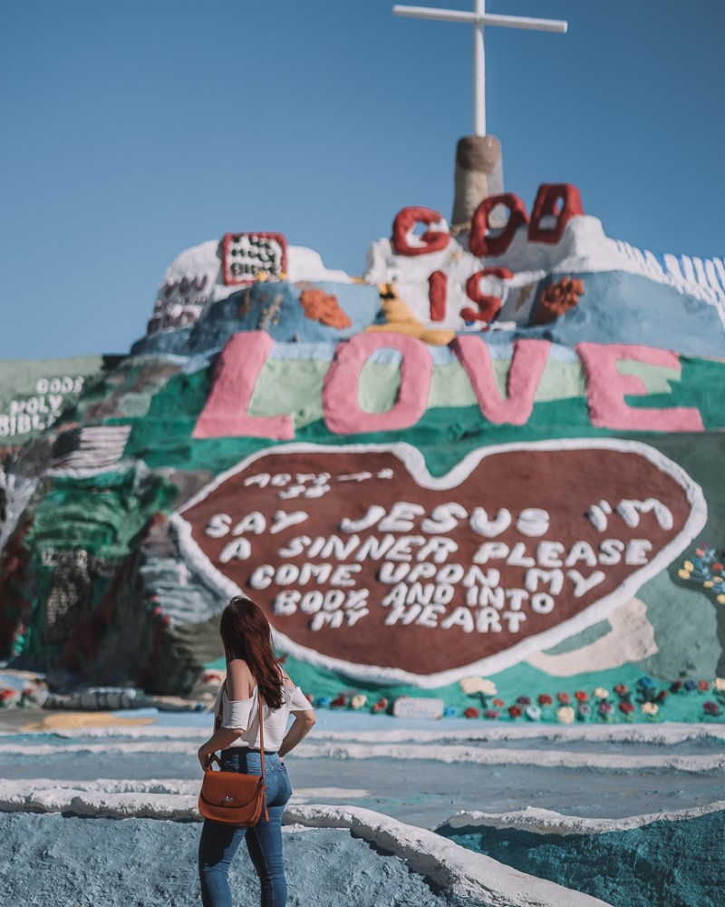 girl in front of Salvation Mountain California | Day Trips from San Diego